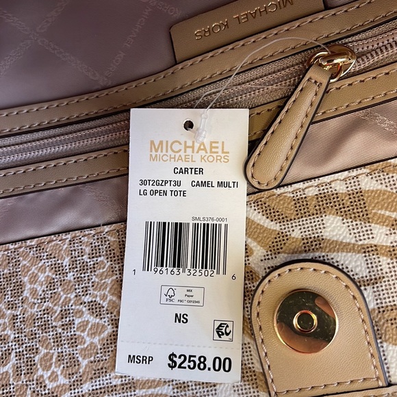 Michael Kors, this Carter Signature Animal Print Semi Lux Open Tote Handbag 
NWT - Picture 14 of 16